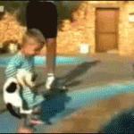 Kid Tries Throwing Cat Into Pool