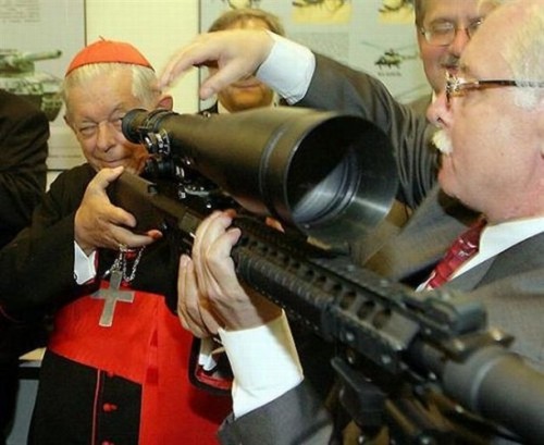 cardinal with gun
